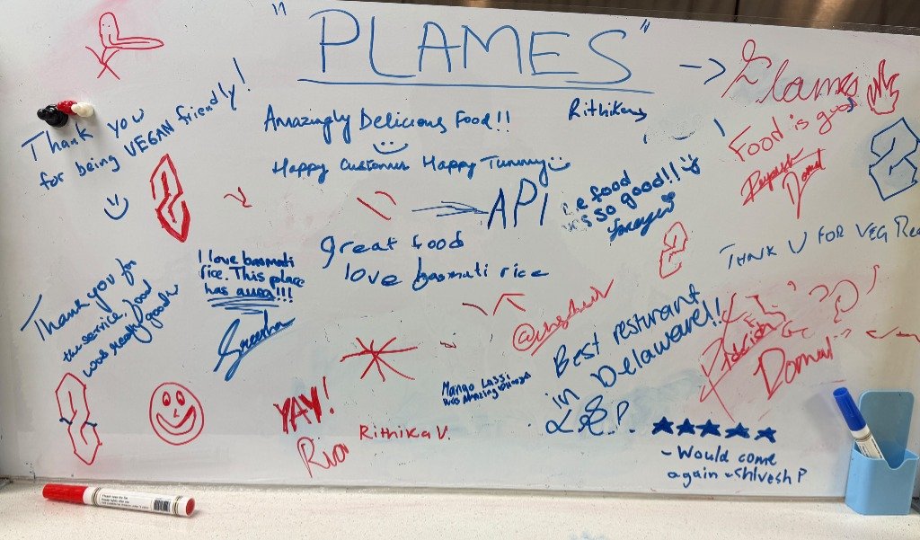 Real Customer Handwritten Reviews on Dining Room Whiteboard at Plames Indian Grill Middletown Delaware